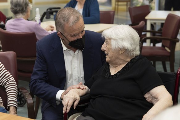 Opposition Leader Anthony Albanese hands out chocolate Easter eggs to residents during a visit to Fairways Retirement Living and Residential Aged Care in Bundaberg, Queensland, on Friday 15 April 2022.