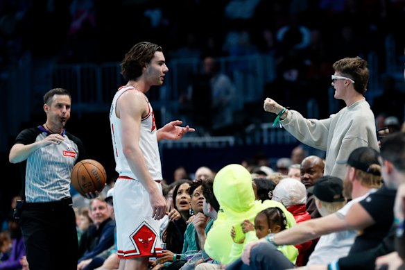 Close encounter: Josh Goode clashed with a fan, who was sitting close to the action.