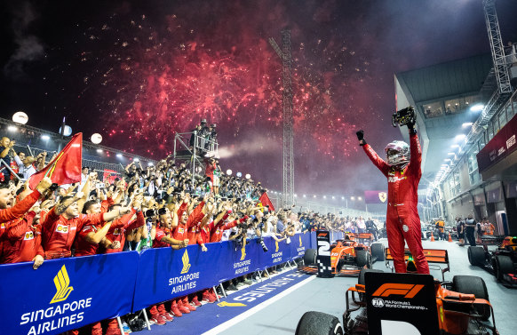 Sebastian Vettel celebrates winning the Singapore Grand Prix for Ferrari on Sunday.