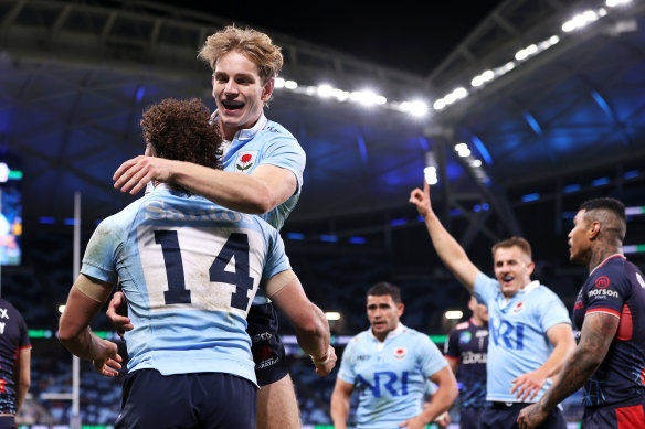 Mark Nawaqanitawase celebrates with Max Jorgensen.