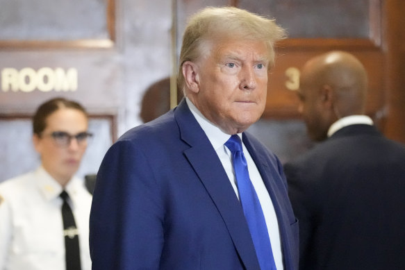 Former president Donald Trump speaks during a break in his civil business fraud trial on Wednesday.