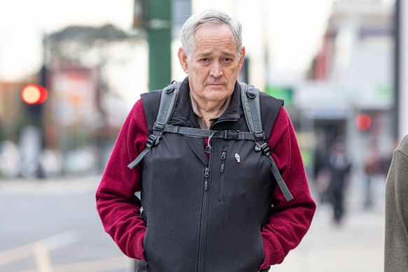 The sole survivor of the beef Wellington lunch, pastor Ian Wilkinson, outside court. 