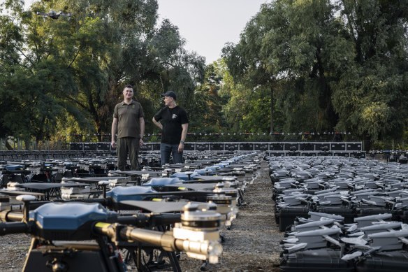 Mykhailo Fedorov, Ukrainian minister of digital transformation, right, and Yuriy Shchygol, head of State Special Communications Service, with some of the 1700 drones that are being sent to the frontline.