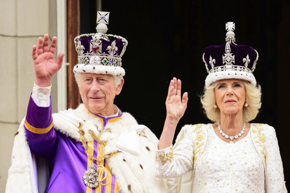 King Charles III and Queen Camilla, wearing a modified crown on the day of the King’s coronation.
