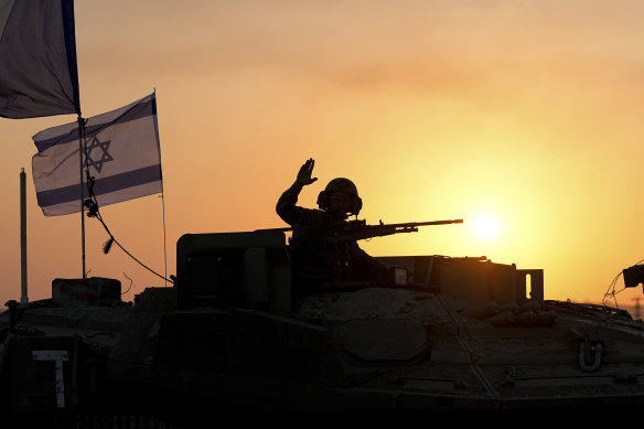 Israeli tanks head towards the border with Gaza.