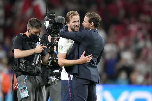 England’s captain and scorer of the winning goal Harry Kane with coach Gareth Southgate.
