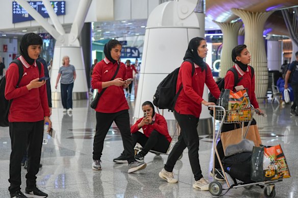 The Iranian women’s soccer team at KL International Airport.