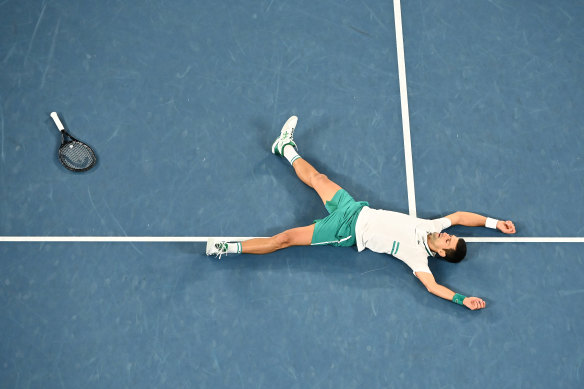Courting success: Novak Djokovic celebrates victory.