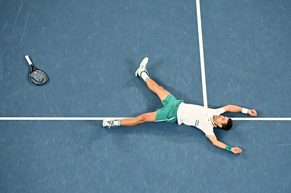 Courting success: Novak Djokovic celebrates victory.