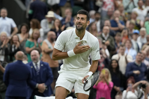 Novak Djokovic reacts after beating Italy’s Jannik Sinner to win their men’s singles semi-final match.
