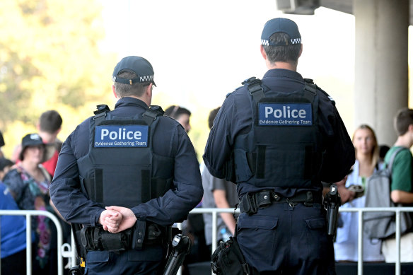 Victoria Police officers outside AAMI Park on Monday night.