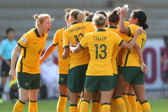 Matildas celebrate their win over the Philippines in India 