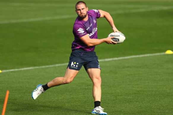 Offloading: Melbourne Storm's Chris Lewis on the ball during a training session at AAMI Park.