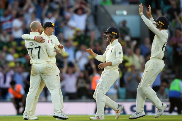 Jack Leach, Joe Root, Rory Burns and Jos Buttler celebrate England's win in the fifth Test.