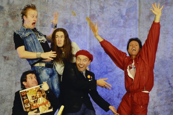 Edmondson (in denim) with the cast of <i>The Young Ones</i> and Cliff Richard in 1986.
