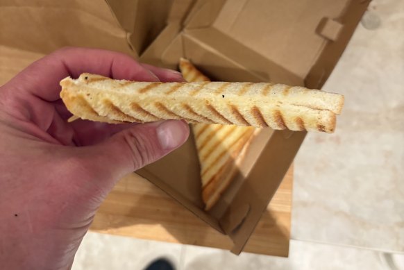 Cheeseless and cheerless: the unfilled toasted sandwich delivered to Nick Simpson.