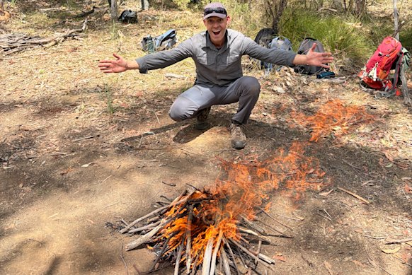 The author demonstrates his newfound fire-starting skills.