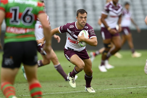 Luke Brooks takes on the Rabbitohs defence in Gosford.