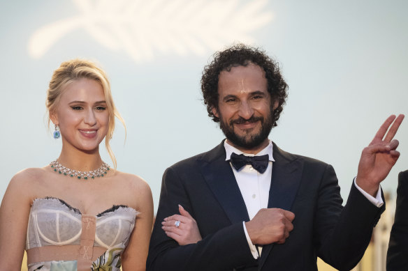 Maria Bakalova and director Ali Abbasi on the red carpet at Cannes.