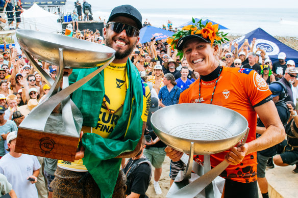 Winners are grinners: 2022 world champions Filipe Toledo and Stephanie Gilmore.