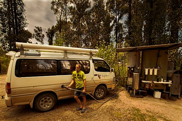 John Hermans at his homemade refuelling station.