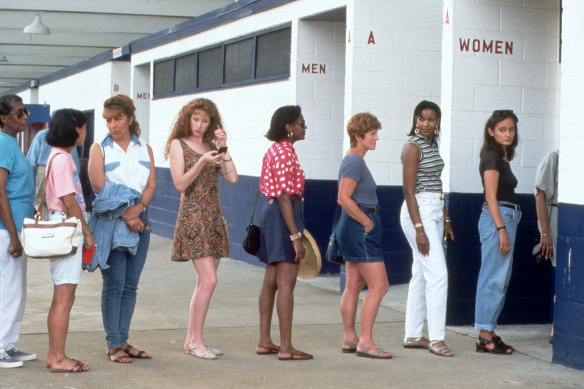 A familiar scene: women queuing for public toilets. Floor space equal to the men’s toilet does not afford women the same convenience. 