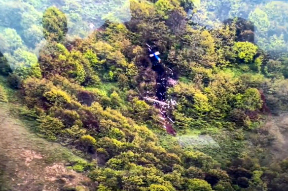 A screen grab captured from a video shows the wreck of the helicopter that had carried Iranian President Ebrahim Raisi and his delegation.