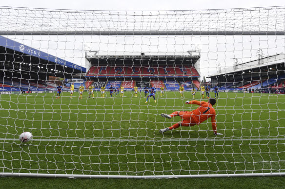 Crystal Palace's Wilfried Zaha sends Brighton goalkeeper Mathew Ryan the wrong way on Sunday.