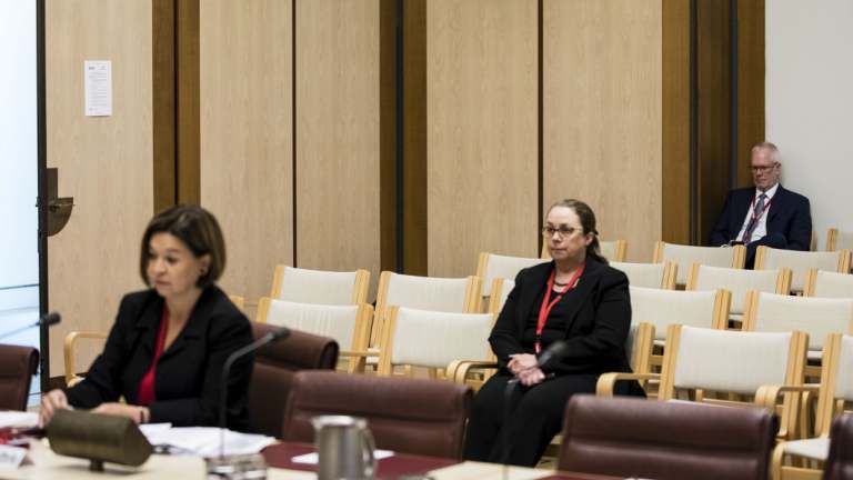 Justin Milne watches on as Michelle Guthrie gives evidence to the Senate inquiry.