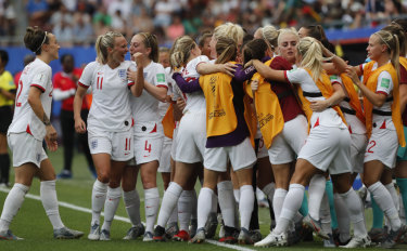 England celebrate Alex Greenwood's goal against Cameroon at the Stade du Hainaut stadium in Valenciennes.
