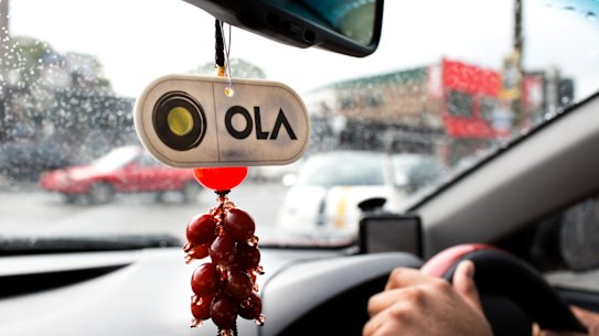 The ridesharing service Ola has offered drivers protective equipment if they spend 50 hours a week on the platforn.