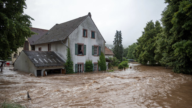 Scores dead, hundreds missing as floods sweep through western Europe