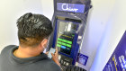 A customer uses a Chivo bitcoin automated teller machine in San Salvador, El Salvador.