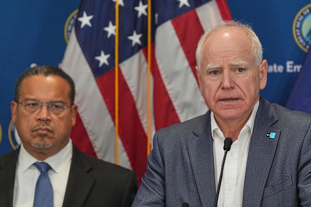 Minnesota Governor Tim Walz, right, and Attorney-General Keith Ellison.
