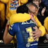 Eels junior Joash Papalii with his father Pele and mother Margaret after the match.