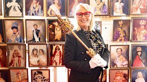 Former Melbourne lord mayor Sally Capp with a Moomba sceptre and portraits of Moomba monarchs.
