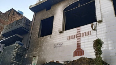 A church burned by an angry Muslim mob is seen in Jaranwala near Faisalabad, Pakistan.