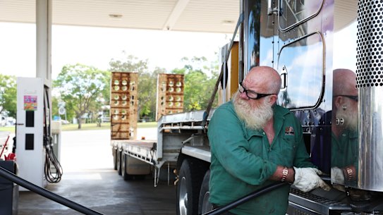 Truck driver Chris Gibbs fills up the tank. Australia's dependence on diesel became a major problem in the Iranian fuel crisis.