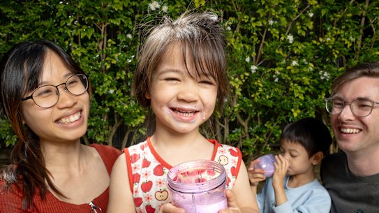 Kitty and Daniel Fewchuk feed their children Hazel, 3, and Lucas, 5, berry smoothies.