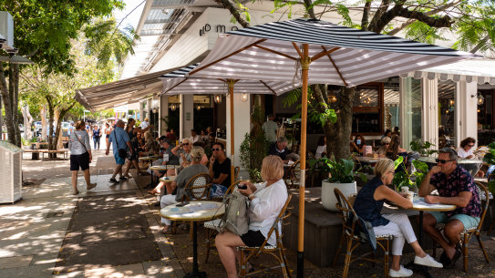 Diners at a restaurant in the Sunshine Coast tourist hub of Noosa. Queensland authorities are yet to put a time frame on continued requirements for staff and patrons at such venues to have had two doses of a COVID vaccine.