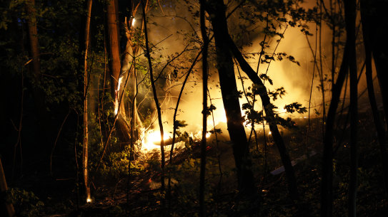 A view of a fire after a Russian military drone was downed in downtown Kyiv.