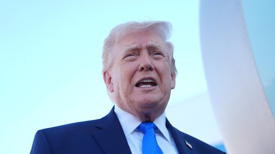 US President Donald Trump speaking to reporters on Monday after his Truth Social post.