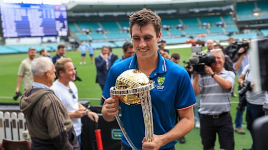 Pat Cummins with the World Cup trophy.