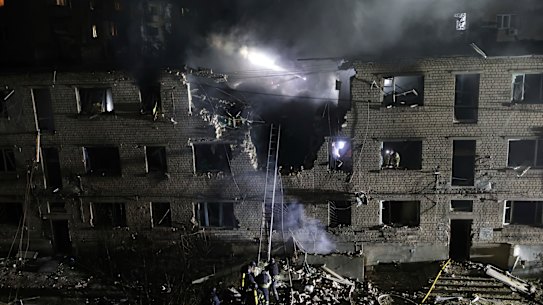 Rescue workers search the site of a building destroyed in a Russian strike in Zaporizhzhia, Ukraine, last week.