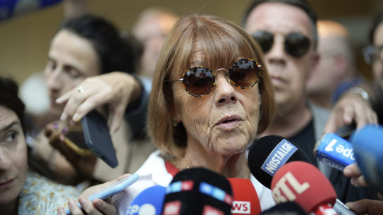Gisele Pelicot speaks to media as she leaves the Avignon court house, southern France.