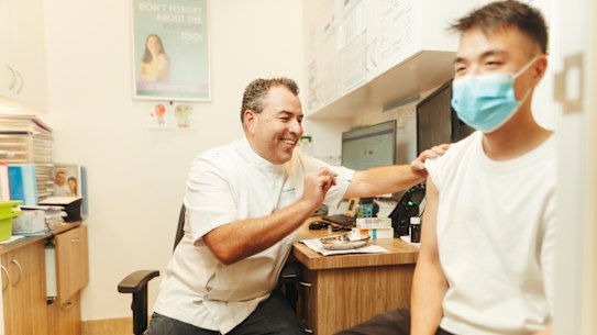 Pharmacist Kevin Santos says bookings for the COVID-19 vaccine have tripled ahead of Christmas. 