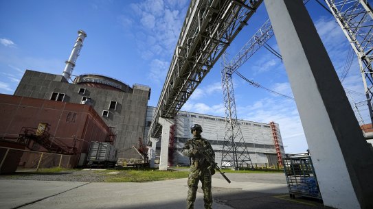 A Russian serviceman guards an area of the Zaporizhzhia Nuclear Power Station.