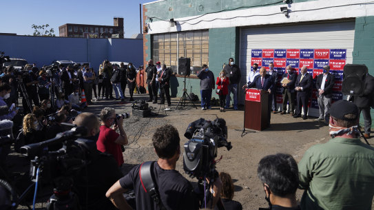 Beyond parody: The Trump administration's bizarre "Four Seasons" press conference in the car park of a landscaping company in industrial Philadelphia.