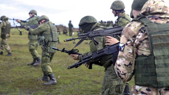 Russian Army recruits hold their weapons during a military training at a firing range in Donetsk on October 4.