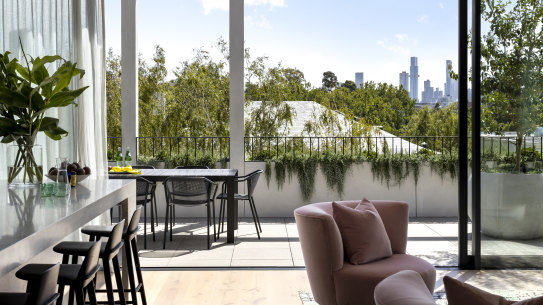 The living room in this Toorak home is upstairs, the bedrooms downstairs.